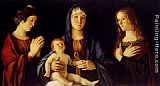 Giovanni Bellini Canvas Paintings - Virgin And Child Between St. Catherine And St. Mary Magdalen
